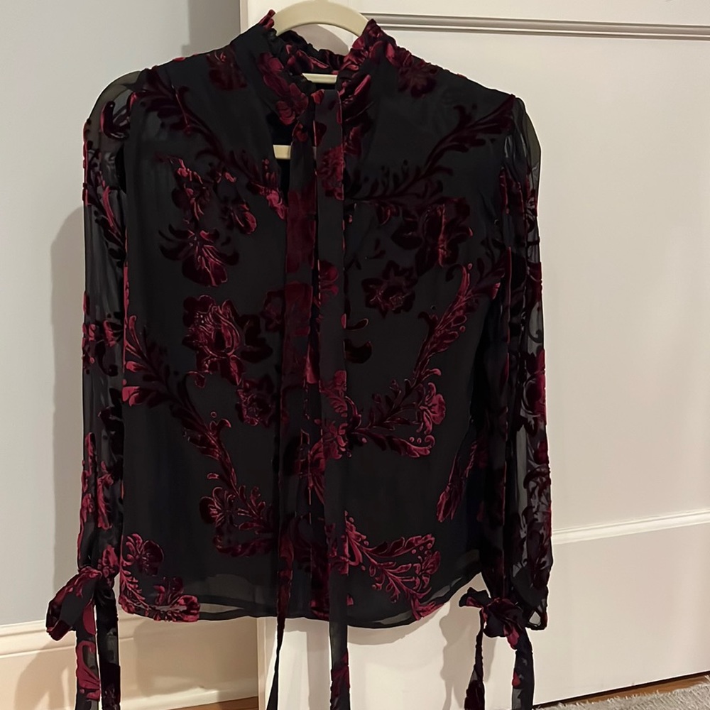 Beautiful LPA dressy top. Ties at sleeve and neck